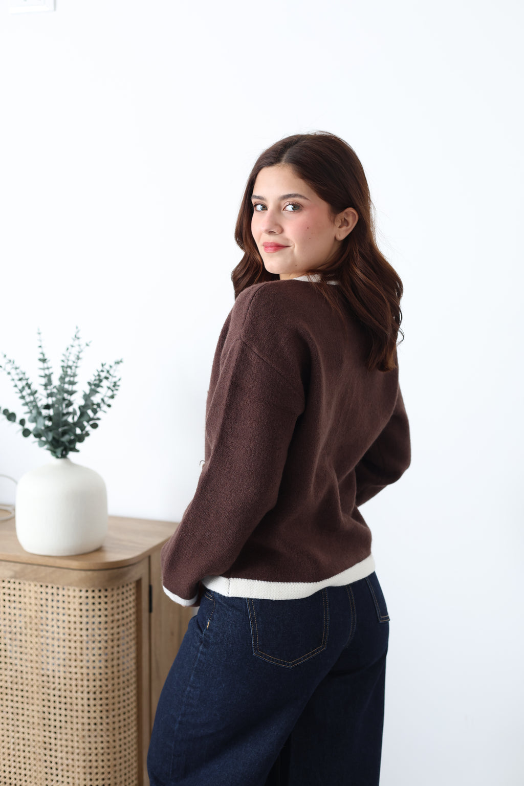 Suéter tejido de botones